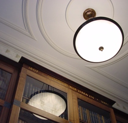 The Bicentenary bookcase in the Lyell Room. The insets are of Burlington Slate, Borrowdale Volcanic Series (Ordovician) from quarries owned by the Cavendish family, former owners of Burlington House